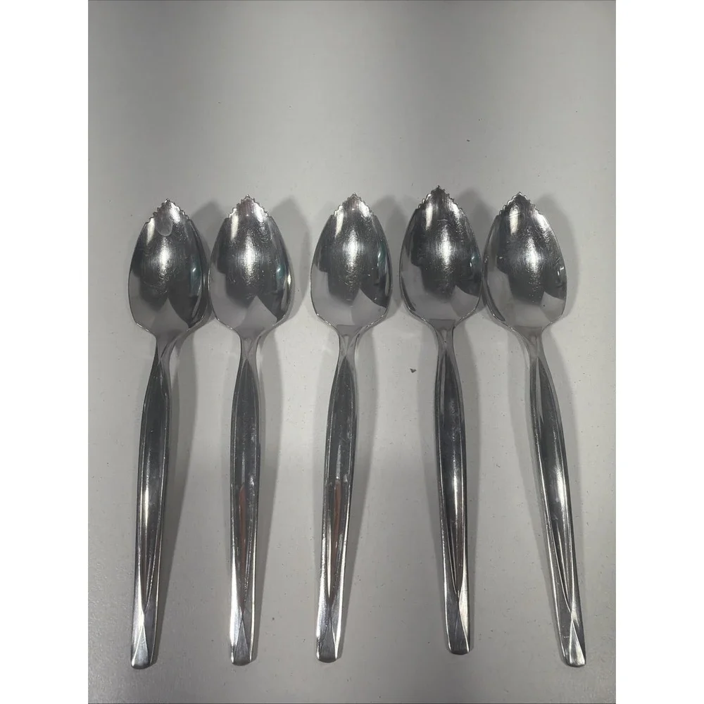 5pc. lot of Vintage Wm. Rogers & Son Serrated Spoon